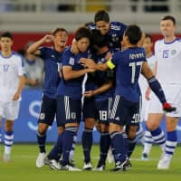 Japan\'s reserves got the job done against Uzbekistan on Thursday in Al Ain, United Arab Emirates to win Group F. | REUTERS