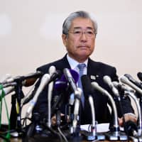 Tsunekazu Takeda, president of the Japanese Olympic Committee, is seen at a news conference in Tokyo on Tuesday. | AFP-JIJI