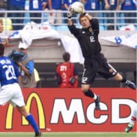 Former Japan national team goalkeeper Seigo Narazaki, seen making a save against Tunisia in the 2002 World Cup, has retired. He played in a record 631 games in the J. League first division. | KYODO