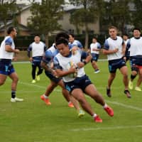 Yusuke Yamada participates in a Toyota Industries Shuttles practice at the team\'s training ground in Toyota, Aichi Prefecture. Yamada is excited to see the Rugby World Cup come to the city this year. | KYODO