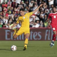 Australia\'s Christopher Ikonomid moves for the ball against Palestine in their Asian Cup Group B match in Dubai, United Arab Emirates, on Friday. | AP