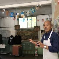 Susumu Tokunaga at Gakko Shokudo, a restaurant in a former elementary school building. | MAIKO MURAOKA