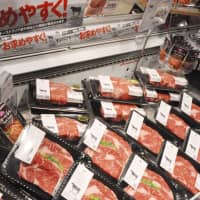 Australian beef is displayed for sale at an Aeon shopping mall in Tokyo. Government data released Wednesday shows Japan\'s beef imports from members of a trans-Pacific free trade pact that took effect late last year soared more than 50 percent in January from a year earlier. | KYODO