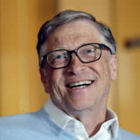 Bill Gates smiles is interviewed in Kirkland, Washington, Feb. 1. | AP