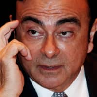 Carlos Ghosn, former chairman of the Mitsubishi and Nissan Alliance, gestures during a news conference at a hotel in Bangkok, Thailand, April 26, 2017. | REUTERS