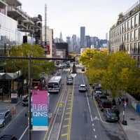 Traffic moves along 44th Drive in Long Island City in the Queens borough of New York. Amazon announced Thursday it was abandoning its plan to create a new headquarters site in New York City, citing opposition from some local political leaders. | AP