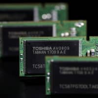 Toshiba Memory Corp. plans to go public on the Tokyo Stock Exchange, perhaps as soon as September, sources have said. | BLOOMBERG