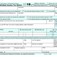 The new Form 1040 tax form for individuals, released by U.S. Treasury Department, is shown in this handout image obtained in June. | DEPARTMENT OF THE TREASURY / HANDOUT / VIA REUTERS