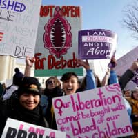 Abortion rights advocates rally at the Supreme Court during the 46th annual March for Life in Washington Jan. 18. | REUTERS