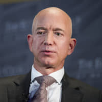Jeff Bezos, Amazon founder and CEO, speaks at The Economic Club of Washington\'s Milestone Celebration in Washington in September. | AP
