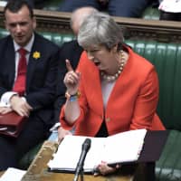 British Prime Minister Theresa May speaks to lawmakers in Parliament on Wednesday. | AP