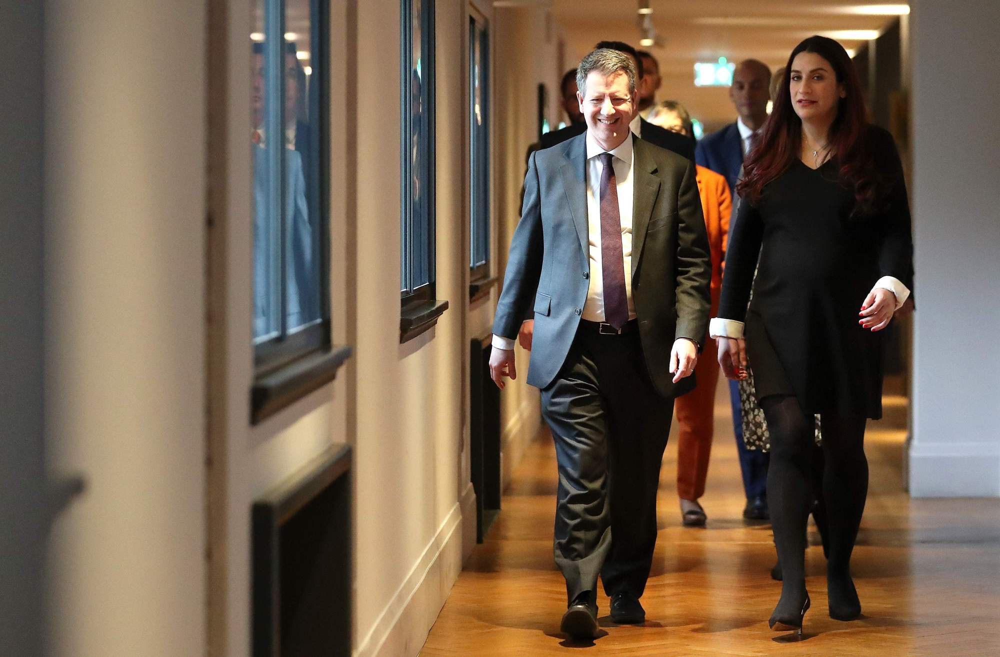 Former Labour party MPs Chris Leslie and Luciana Berger arrive for a news conference in London on Monday where they and colleagues announced their resignation from the Labour Party and the formation of a new independent group of lawmakers. | AFP-JIJI
