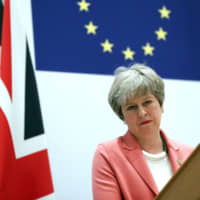 British Prime Minister Theresa May speaks during a news conference at the conclusion of an EU-Arab League summit in Sharm el-Sheikh, Egypt, on Monday. | AP