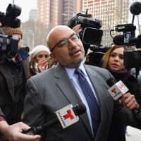 Eduardo Balarezo, attorney for Joaquin \"El Chapo\" Guzman, arrives at the U.S. Federal Courthouse on Tuesday in Brooklyn, New York. Accused of smuggling tons of cocaine, heroin, methamphetamines and marijuana into the United States over a 25 year period, Guzman faces possible life in prison if found guilty of the 10 felony charges against him. | AFP-JIJI