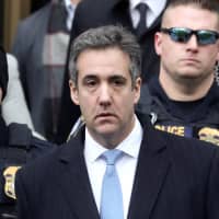 Michael Cohen, U.S. President Donald Trump\'s former attorney, exits the United States Court house after his sentencing, in the Manhattan borough of New York City Dec. 12. | REUTERS