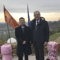This 2018 photo provided on Jan. 3 by Italian Sen. Valentino Perin shows the senator (right) posing for a photo with then North Korean diplomat Jo Song Gil on the occasion of a cultural event with the Veneto region at a restaurant in San Pietro di Felletto, near Treviso, northern Italy. Italy\'s foreign minister said Wednesday that Italy is investigating whether the 17-year-old daughter of Jo was forcibly returned to Pyongyang as her parents apparently tried to defect. | VALENTINO PERIN / VIA AP