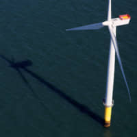 The Walney Extension offshore wind farm operated by Orsted is seen off the coast of Blackpool, England, last September. | REUTERS
