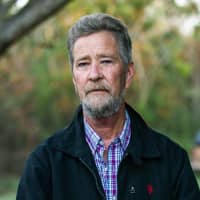 Leslie McCrae Dowless Jr. poses for a portrait outside of his home in Bladenboro, North Carolina, in December. The Republican in the nation\'s last undecided congressional election said Monday he recruited Dowless, a political operative now at the center of a ballot fraud investigation, because he produced election results in his rural North Carolina county and other Republicans vouched for him. | TRAVIS LONG / THE NEWS