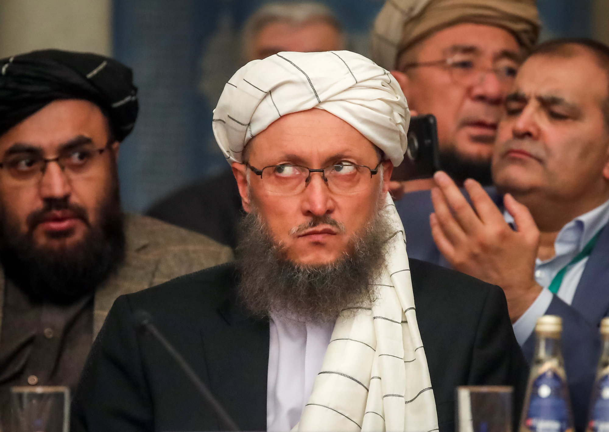 Abdul Salam Hanafi, the deputy head of the political office for the Taliban, attends a conference arranged by the Afghan diaspora in Moscow on Tuesday. | REUTERS
