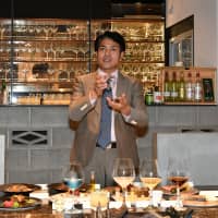 Mikio Atobe showcases dishes he plans to serve at his restaurant in Ginza, including fermented food products and dry aged beef and fish made with aging sheets, on Feb. 18. | YOSHIAKI MIURA
