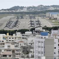 U.S. Marine Corps Air Station Futenma is surrounded by a crowded residential area in Ginowan, Okinawa Prefecture. | KYODO