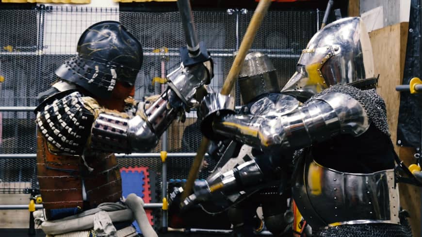 A fighter in samurai armor spars with an opponent dressed in the armor of a medieval European knight on Feb. 10 at Castle Tintagel, a medieval martial arts school in Tokyo