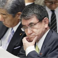 Foreign Minister Taro Kono attends a Lower House committee meeting on Wednesday. | KYODO