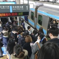 Delays continued Wednesday morning at Nishikawaguchi Station in Saitama Prefecture after services were restored following an accident on the Shonan Shinjuku Line. | KYODO