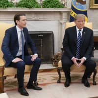 U.S. President Donald Trump and Sebastian Kurz, Austria\'s chancellor (left), meet in the Oval Office of the White House in Washington Wednesday. | CHRIS KLEPONIS / POOL / VIA BLOOMBERG