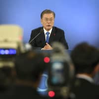 South Korean President Moon Jae-in faces the media at his first news conference of the year on Jan. 10. The Japanese government says Seoul has failed to respond to its request to launch talks on the thorny bilateral issue of wartime labor. | KYODO