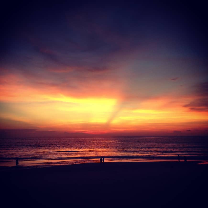 The sun sets on Karon Beach on Phuket Island.