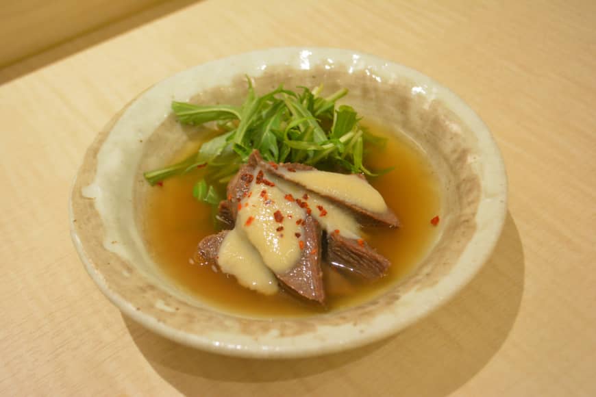 New classic: Beef tongue with white miso and flecks of chili in a dashi soup.