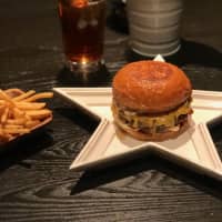 A star is born: The Real Baran burger at Aldebaran is an instant classic packed with a wagyu patty, soft-cooked egg, melted cheddar, teriyaki sauce and spicy onion chutney. | ROBBIE SWINNERTON