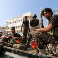 War zone: The Foreign Ministry is preventing journalist Kosuke Tsuneoka from visiting Yemen, which is embroiled in civil war. | REUTERS
