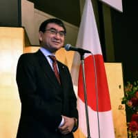 Foreign Minister Taro Kono offers words of congratulation at The Capitol Hotel Tokyu on Feb. 14. | YOSHIAKI MIURA