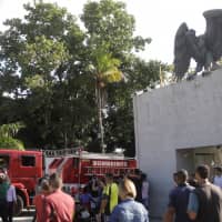 A fire truck is seen in front of the training center of soccer club Flamengo after a deadly fire in Rio de Janeiro on Friday. | REUTERS