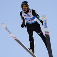 Ryoyu Kobayashi makes a jump during the ski jumping event at the FIS Nordic World Ski Championships on Saturday in Innsbruck, Austria. | AP