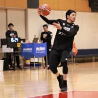 Japan guard Ryusei Shinoyama passes the ball during the team\'s practice at the National Training Center on Tuesday. | KAZ NAGATSUKA