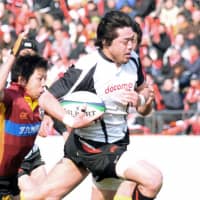 Takuro Miuchi, seen playing for NTT in 2011, represented Japan at two Rugby World Cups. | KYODO