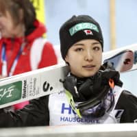 Sara Takanashi reacts after finishing sixth in the normal hill individual event at the FIS World Nordic Ski Championships in Seefeld, Austria, on Wednesday. | KYODO