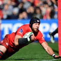 The Sunwolves\' Tom Rowe scores a try against the Waratahs during their Super Rugby match on Saturday at Prince Chichibu Memorial Rugby Ground. | AFP-JIJI
