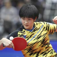 Fourteen-year-old Miyu Kihara competes in the final of the  women\'s singles tournament of the All Japan Table Tennis Championships at Maruzen Intec Arena Osaka in January. | KYODO