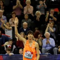 High jumper Naoto Tobe gestures to the crowd during the Birmingham Indoor Grand Prix on Feb. 16 in Birmingham, England. | REUTERS