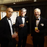 French Consul General Jean-Matthieu Bonnel (far left) attends a party with Australian Consul General David Lawson (center) and German Consul General Werner Kohler to celebrate the 150th anniversary of the Kobe Consular Corps in Osaka on Feb. 1. Originally formed in Kobe after it opened to international trade in 1868, the Kansai Consular Corps now represents more than 50 countries. | ERIC JOHNSTON