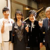Japan\'s four gold medal laureates (from left) Francoise Morechand (Cultural Influence), Keiko Kishi (Cultural Influence), Akiko Santo (Solidarity and Value) and Hisanori Isomura (Francophone Value) pose during an awards ceremony hosted by La Renaissance Francaise, which was founded in 1916 to promote French culture, at the French ambassador\'s residence in Tokyo on Feb. 6. | MIDORI HIRAHARA