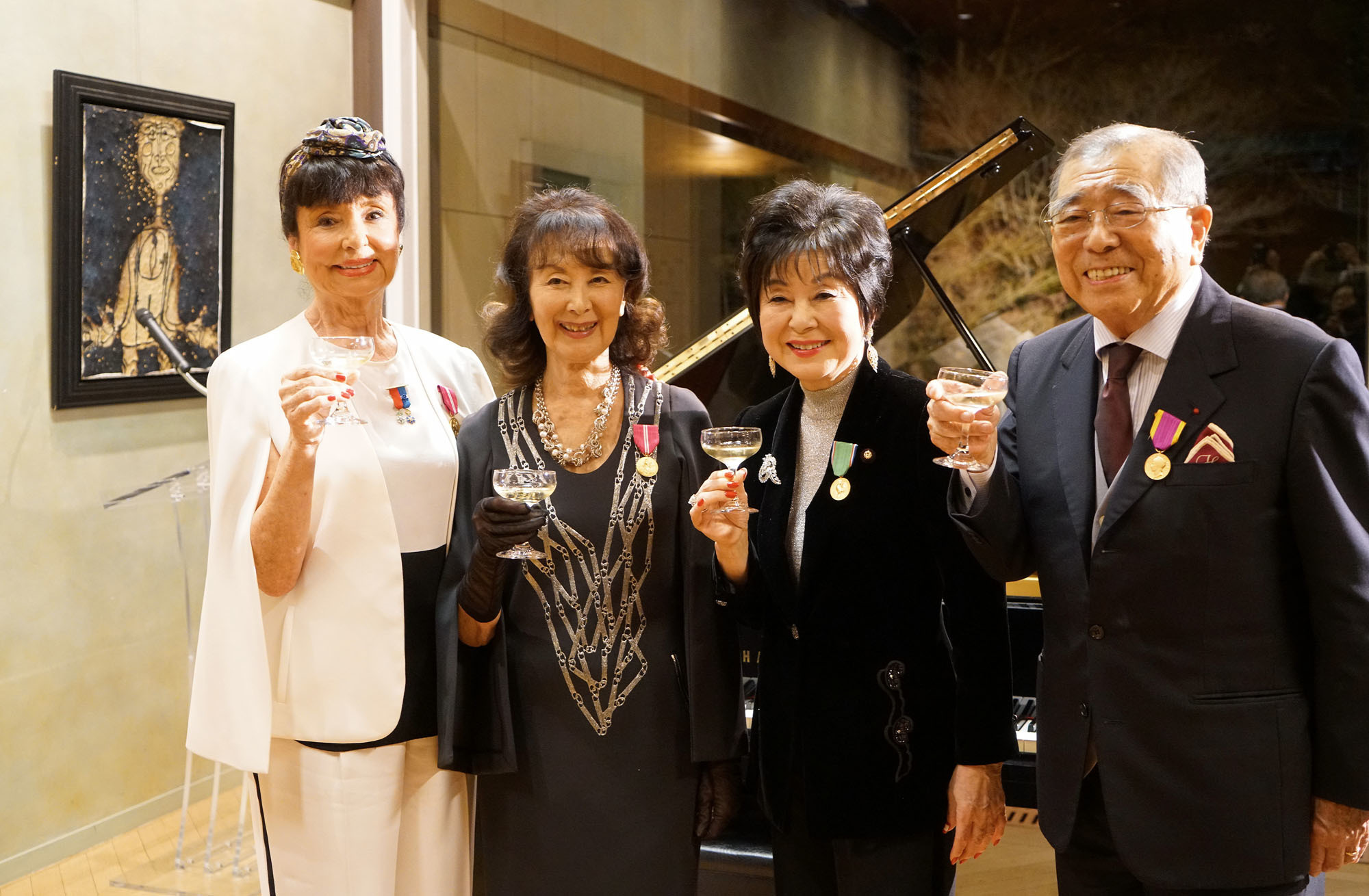 Japan's four gold medal laureates (from left) Francoise Morechand (Cultural Influence), Keiko Kishi (Cultural Influence), Akiko Santo (Solidarity and Value) and Hisanori Isomura (Francophone Value) pose during an awards ceremony hosted by La Renaissance Francaise, which was founded in 1916 to promote French culture, at the French ambassador's residence in Tokyo on Feb. 6. |  MIDORI HIRAHARA