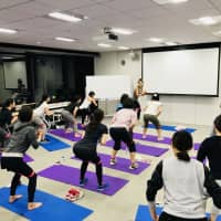 Rohto Pharmaceutical Co. employees participate in an exercise session. They can take part in such activities using Aruco in-house currency, which they earn based on their daily efforts and achievements toward improving their health. | ROHTO PHARMACEUTICAL CO.