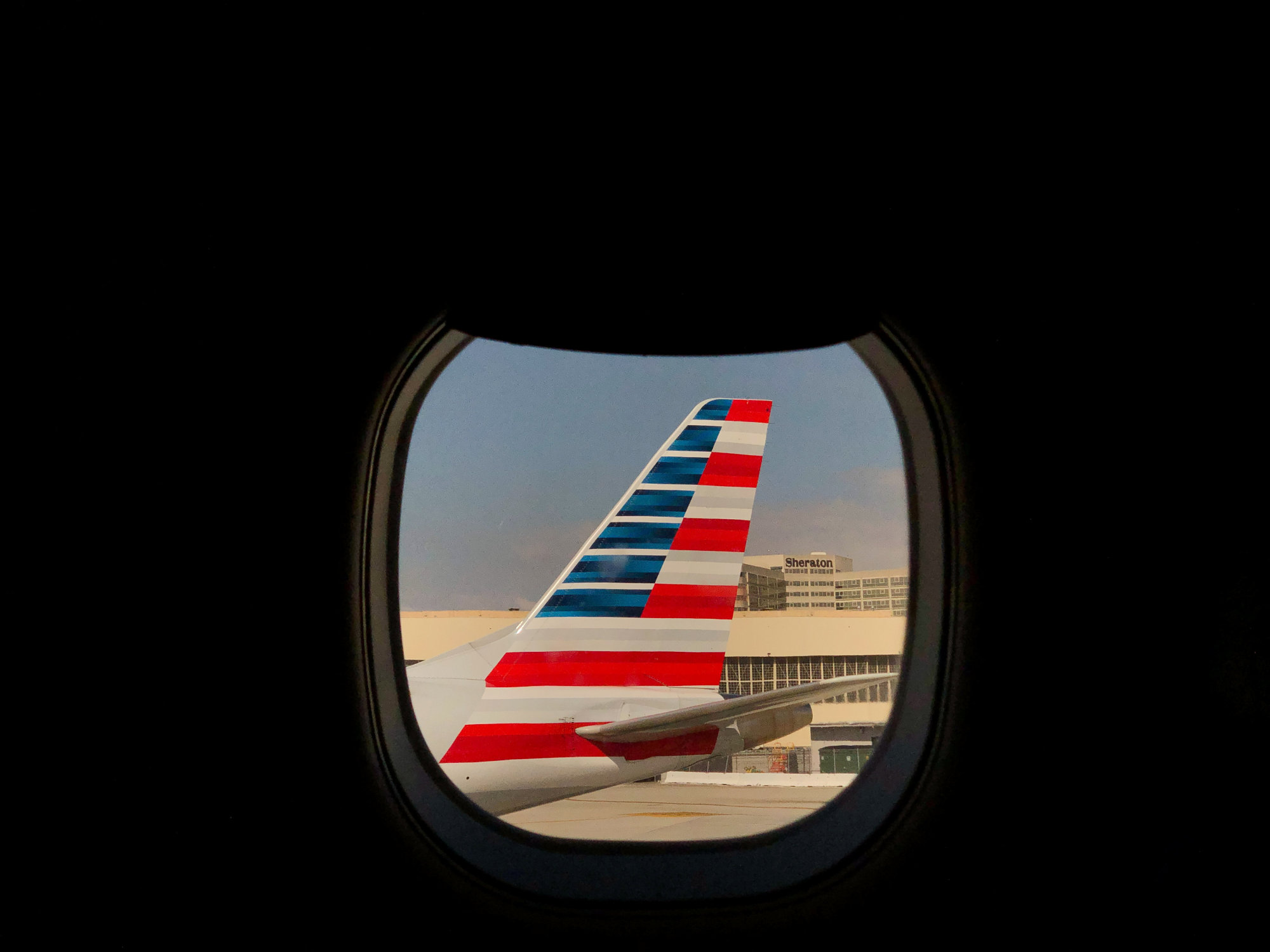 An American Airlines plane sits on the tarmac at LAX in Los Angeles Monday. | REUTERS