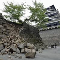 A collapsed stone wall at Kumamoto Castle is seen in May 2016, a month after two powerful earthquakes jolted central Kyushu. | KYODO