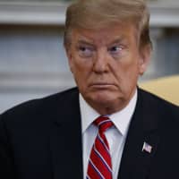 President Donald Trump meets with Brazilian President Jair Bolsonaro in the Oval Office of the White House Tuesday in Washington. | AP